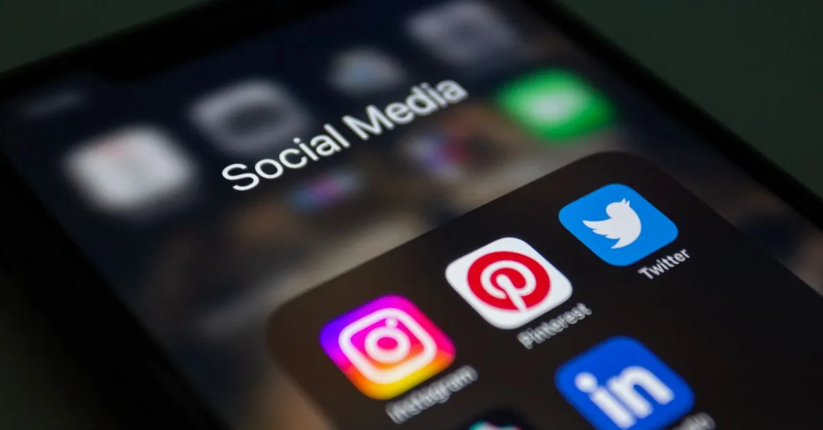 Social media apps on a phone used to build brand awareness